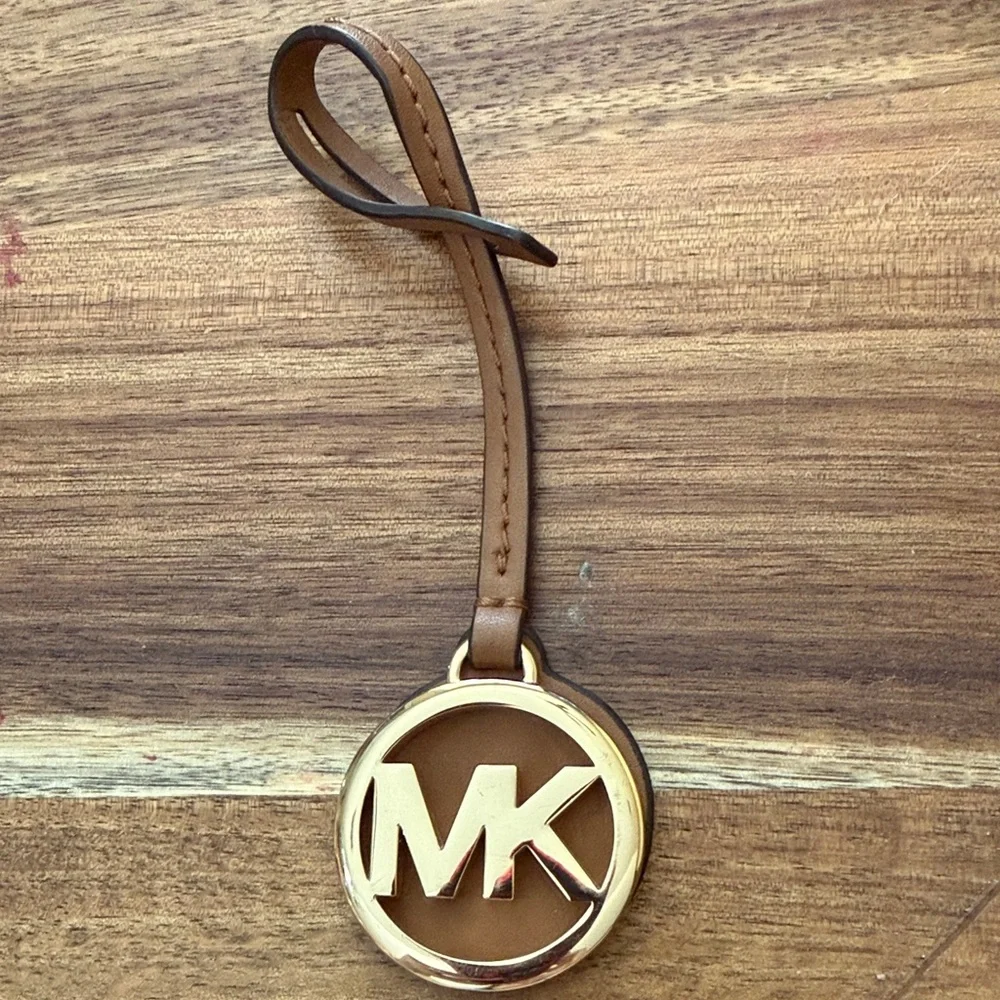 Michael Kors Brown and Gold bag tag